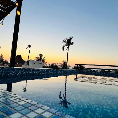 Hotel Mayari Holbox Экстерьер фото Sunset at the pool