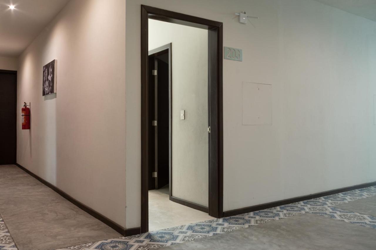 Hotel Mayari Holbox Экстерьер фото A door opening