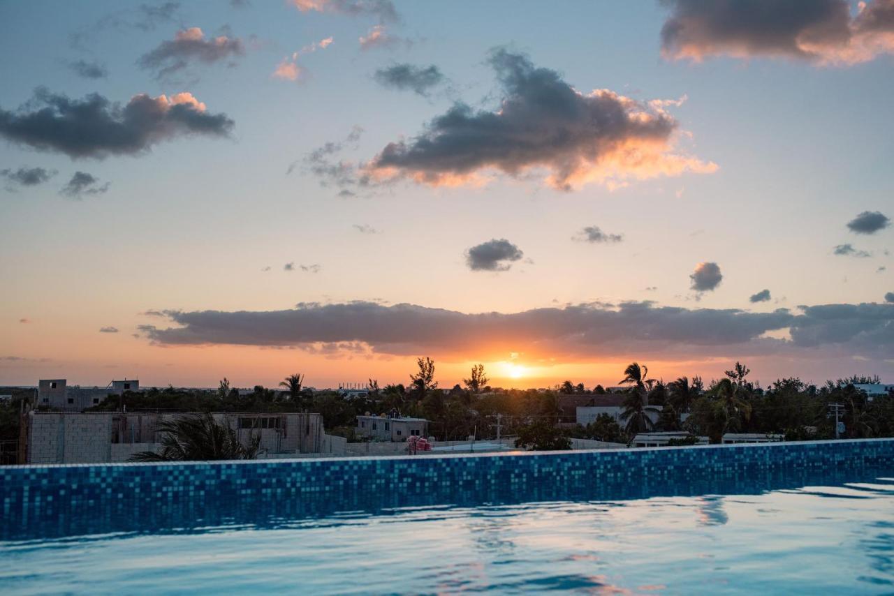 Hotel Mayari Holbox Экстерьер фото Sunset over Tulum