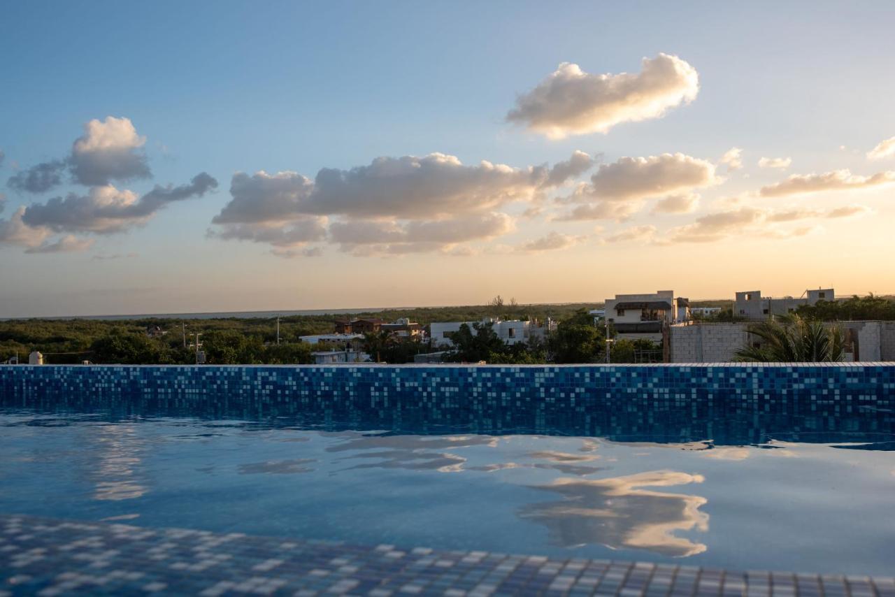 Hotel Mayari Holbox Экстерьер фото Sunset over Tulum