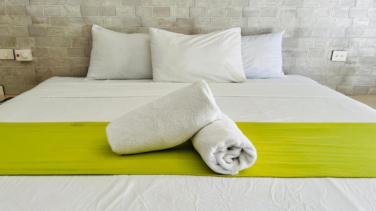 Hotel Mayari Holbox Экстерьер фото Bath towels on a bed